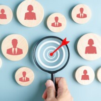 Magnifier glass focus to manager icon which is among staff icons