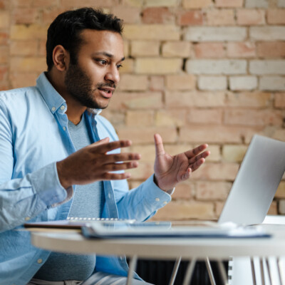 Man working with laptop in office