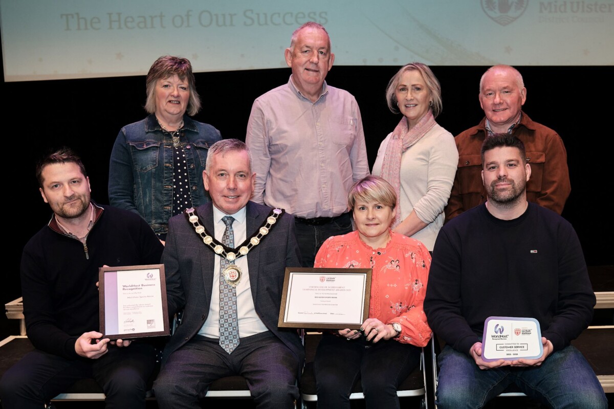 Cookstown Leisure Centre and Mid Ulster Sports Arena representatives with Councillor Eugene McConnell awarded WorldHost Business Recognition